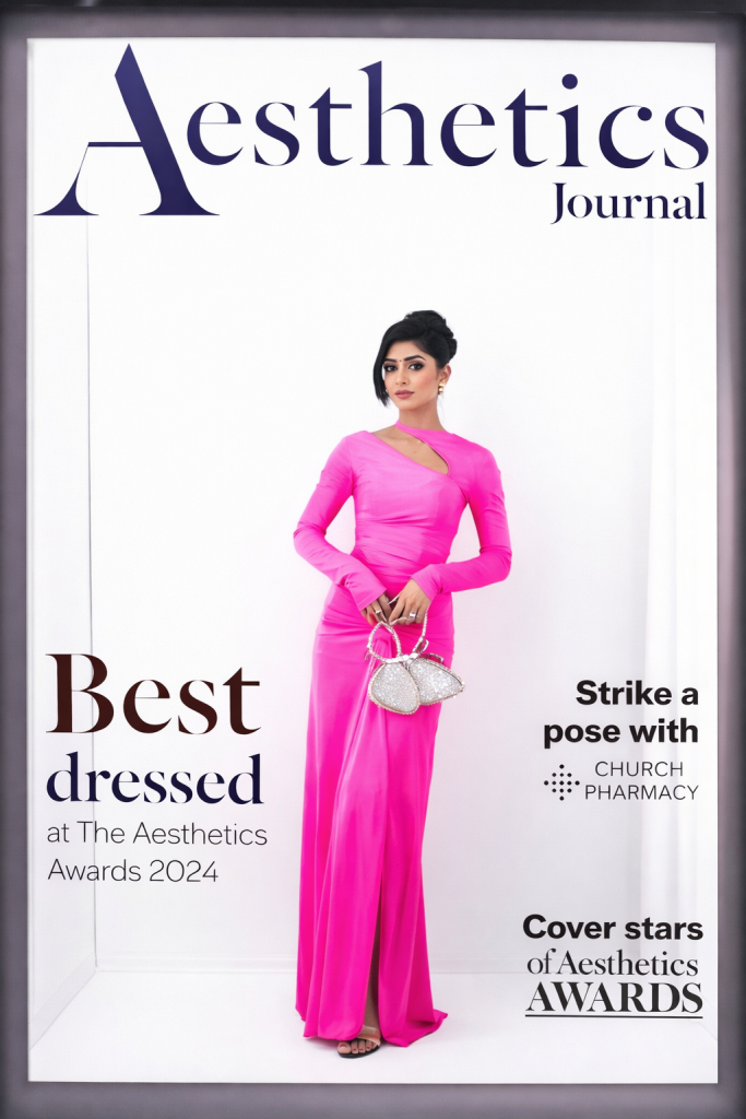 girl in a pink dress in a magazine photo booth london